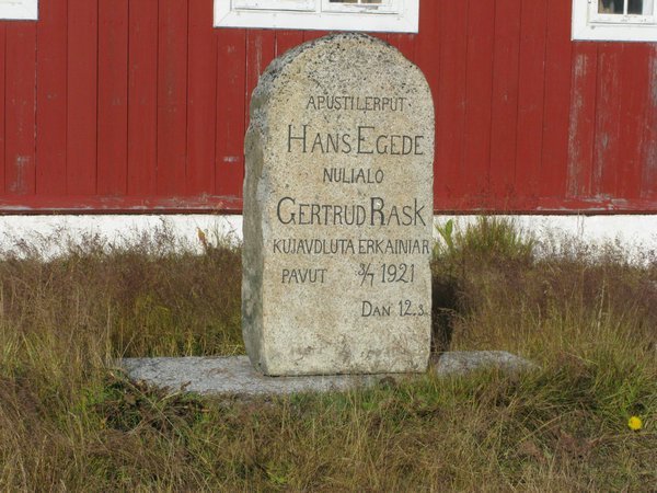 Tombstone beside church