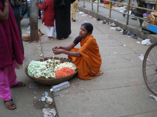 Woman making flower decorations for hair