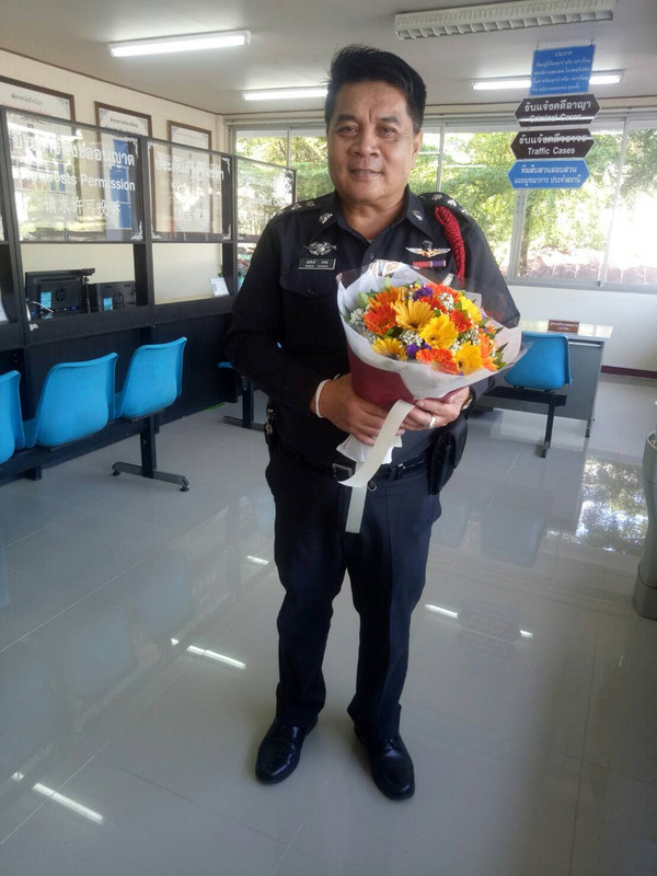 One of the police officers. I sent flowers as thanks for the help with the phone and passport