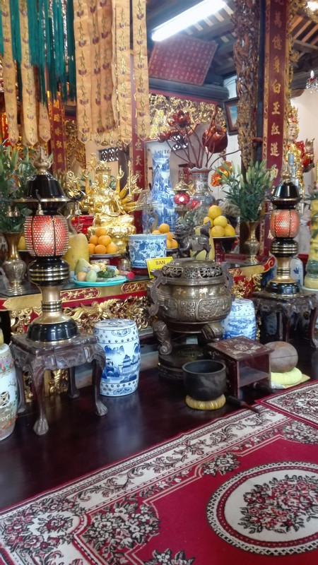 Offerings inside a temple in Hanoi