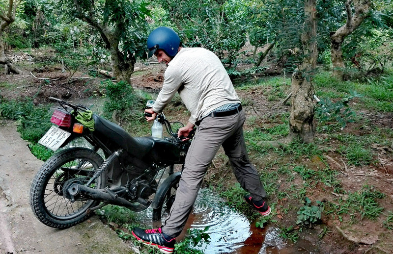 Just slipped off the narrow "road" and fell very slowly into the muddy water, Mekong delta Vietnam