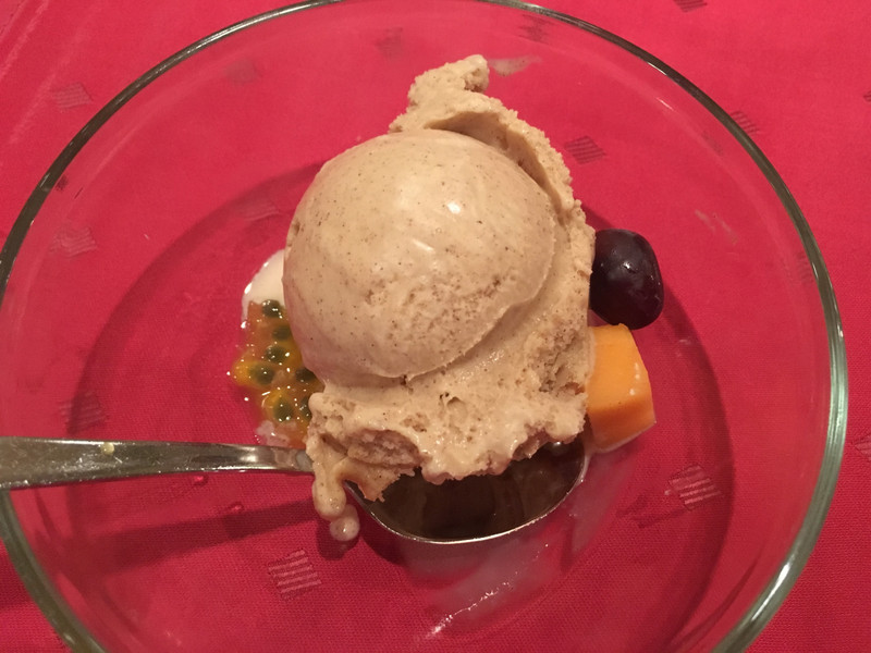 Homemade cinnamon gelato, with passionfruit, cantaloupe and grape on the side