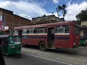 Public bus and tuk tuk