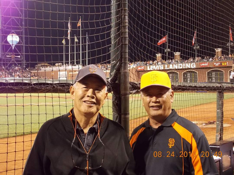 My brother Bob, and I at the Giants game