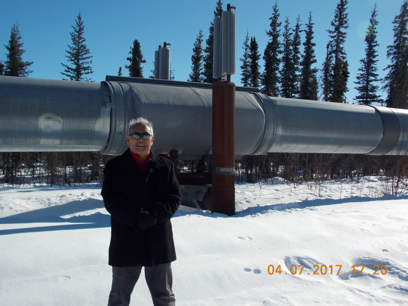 Standing in front of the Trans Alaska pipeline