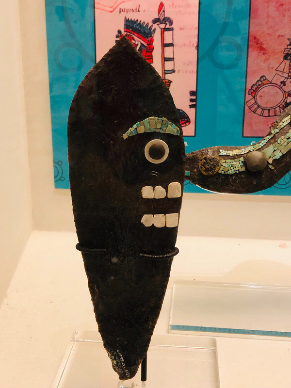 Obsidian flint knife with decorated eye and teeth