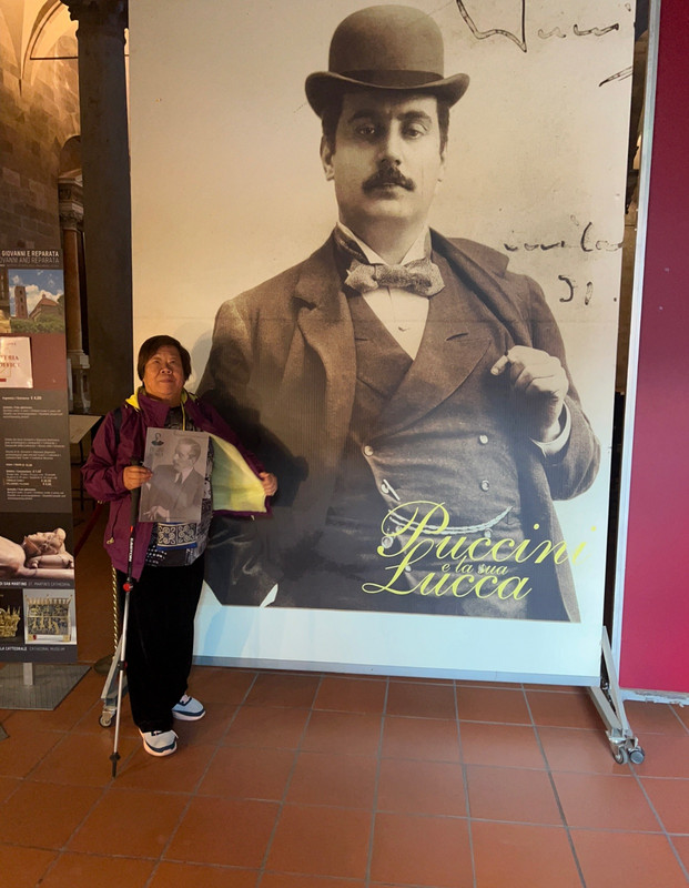 In front of Puccini's picture