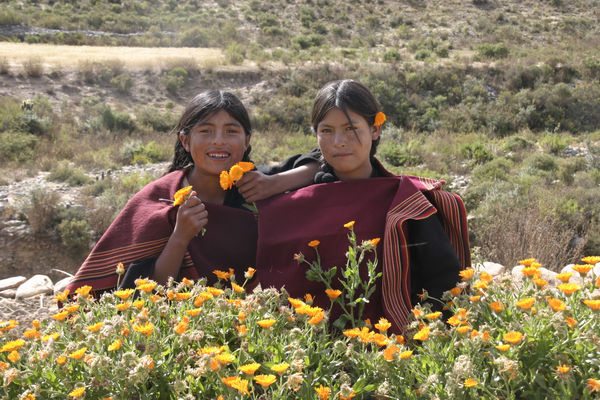 Two girls from Puka Puka in traditional Quechua clothing