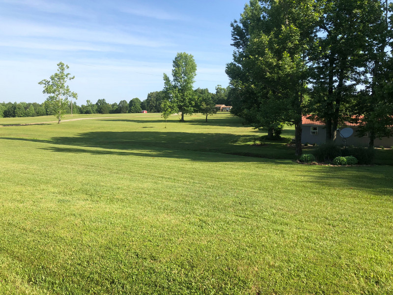 Acres of grass to mow on this property.