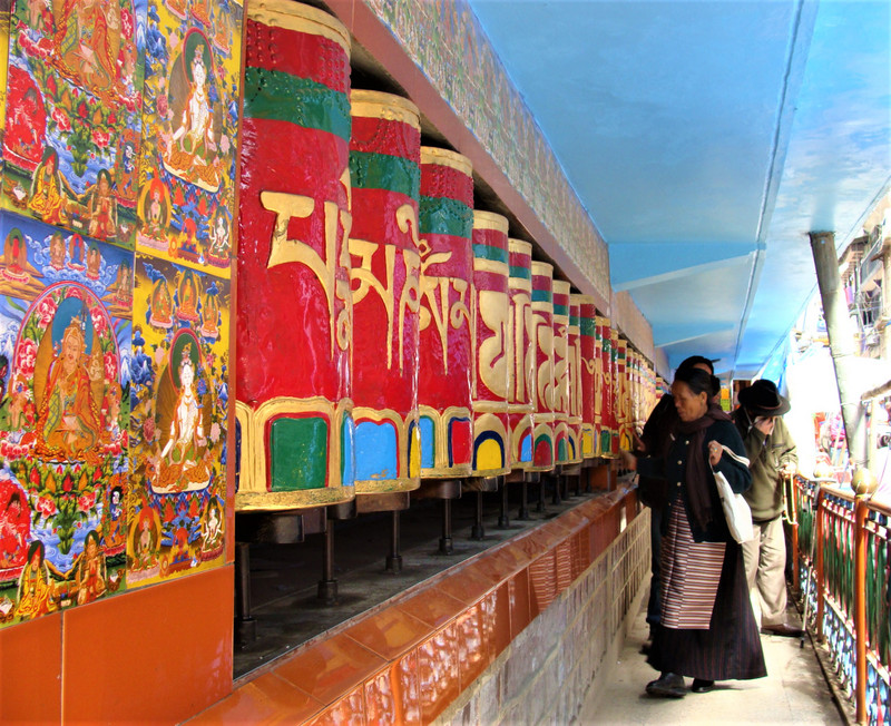 Spinning Tibetan prayer wheels