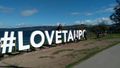 Taupo sign just begged to be climbed