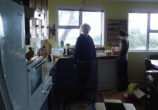 Helen and Hyunah unpacking our kitchen