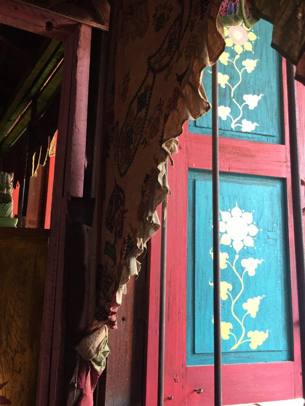 Painted shutters at the Nepal coffee shop