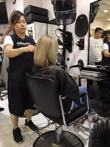 Jane at the hairdressers, Singapore 