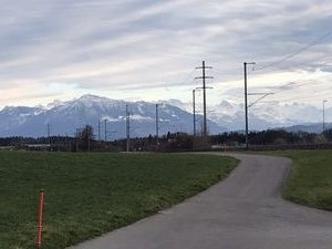Snow on mountains. Walking back from the station 