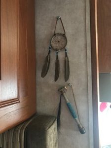 navajo dream catching and warrior weapon to ward off evil spirits