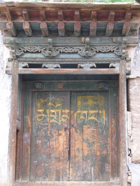 Monastery door in the Tibetan village.