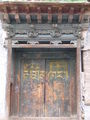 Monastery door in the Tibetan village.
