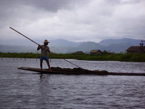 Man rowing on Inle Lake