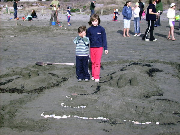 Sand sculpture competition and midwinter swim