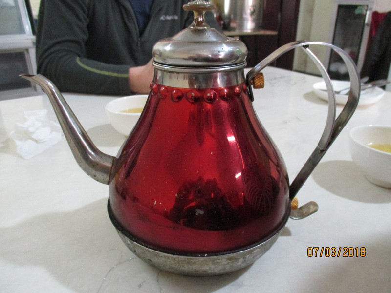 Typical non-drip teapot.