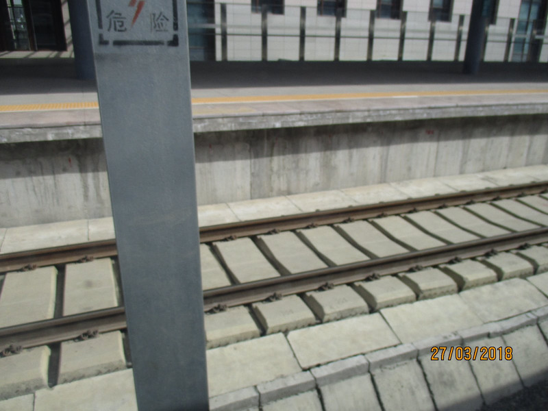 Railway track beside a platform