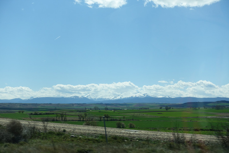 Snow capped mountains on the way