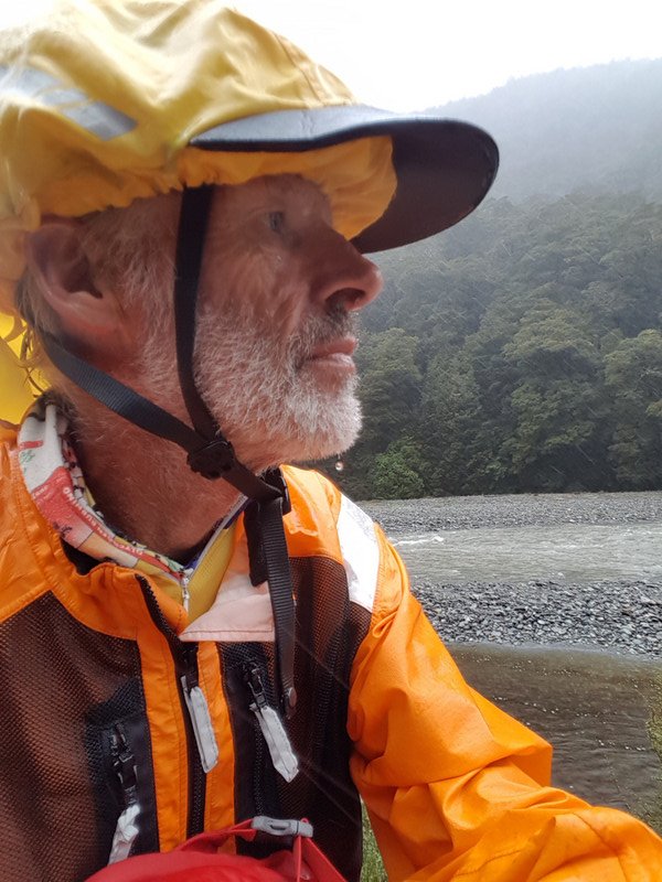 Rain and the Donkey on what the Donkey thinks is the highest point of Haast Pass, photo check point