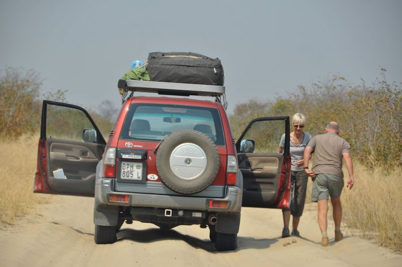 David and Veronica in the Toyota starting on the sand across Northern Botswana