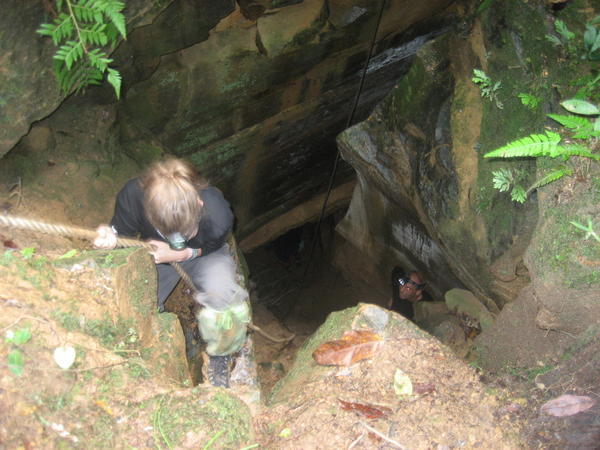 Denai going into the cave.