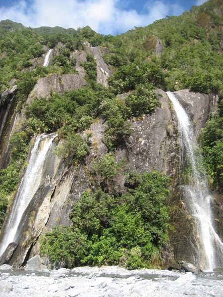 waterfalls surrounding the glaciers.