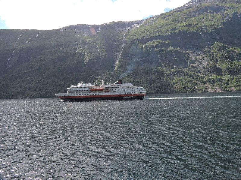 The Hurtigruten passing on by on Geirangerfjord