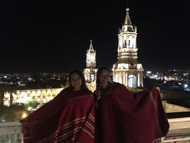 Rooftop Drinking in Ponchos
