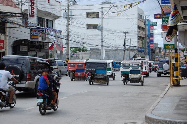 Roads in Bohol...see the little moto taxis?
