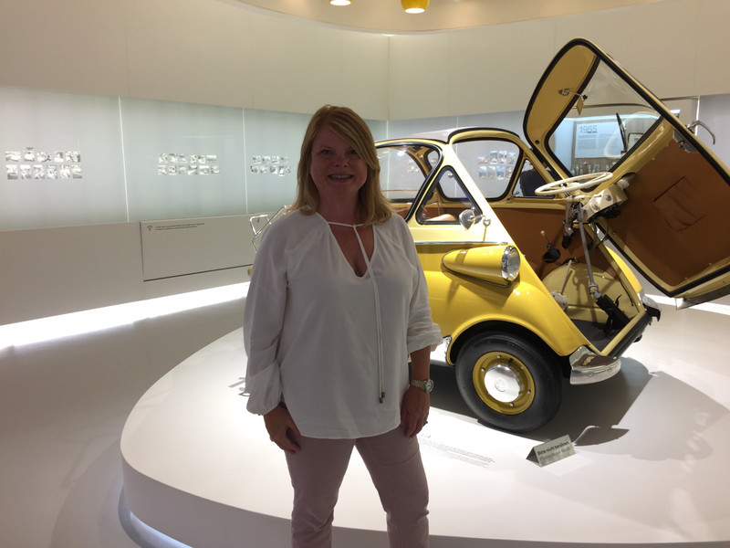 Sophie with front loader car in BMW museum