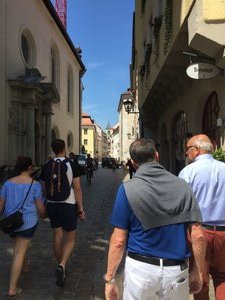 Jack and Peter walking through old Regensburg