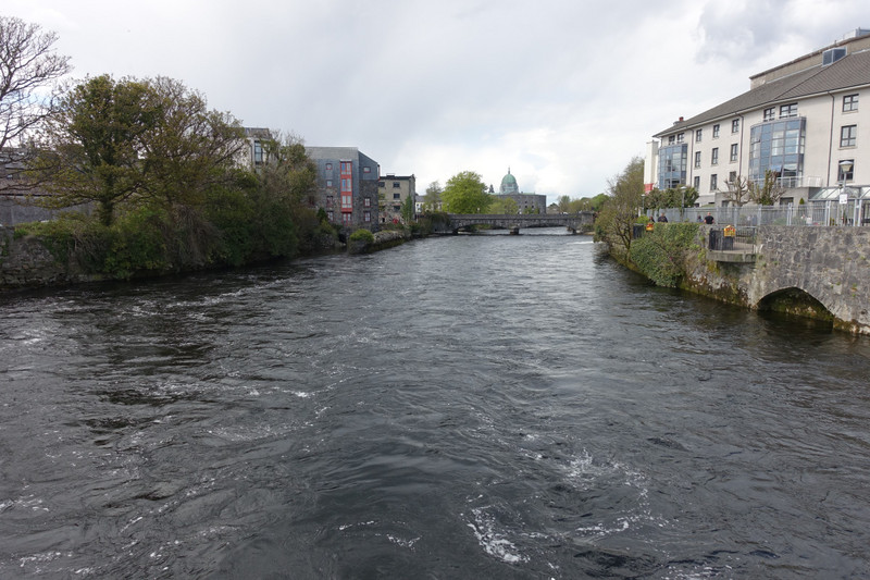 View from William O'Brien Bridge over the fast flowing River Corrth in the middle of the city.