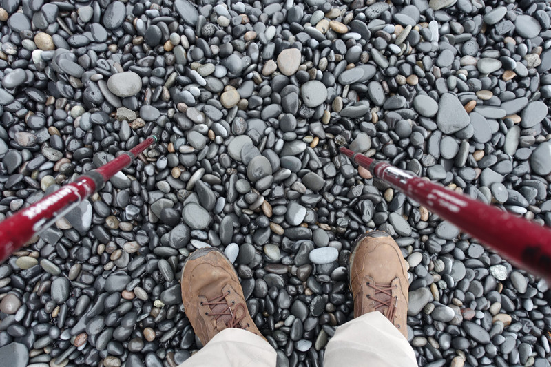 Black beach pebbles.