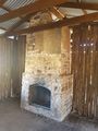 Fireplace inside hut