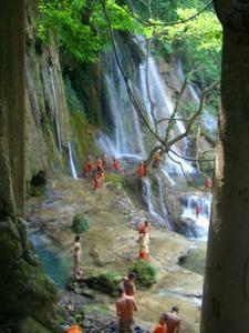 Monks at the top of the Waterfall in Luang Prabang 