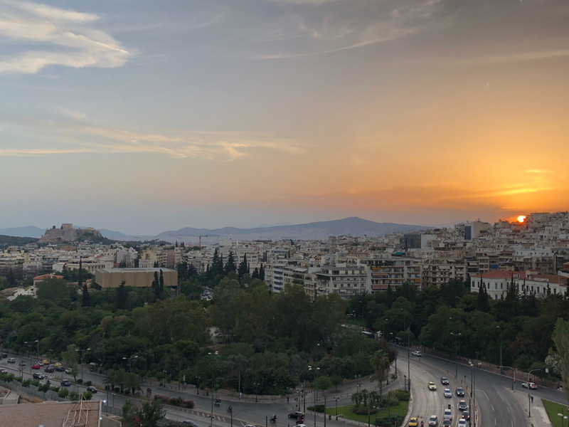 Sunset from room balcony, Acropolis on left.