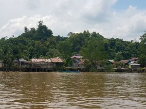 Boat journey up a Borneo river