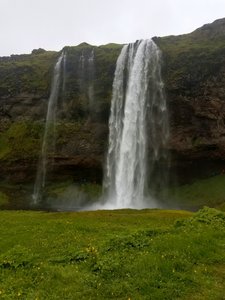 Seljalandsfoss, most known because you can walk around behind it