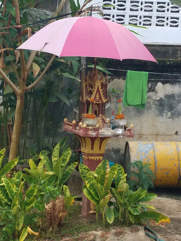 Buddhist shrine with its very own umbrella