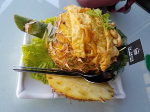 Pineapple fried rice (or, fried rice in a pineapple)