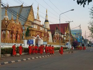 Wat Luang - much less touristy place to watch the alms ceremony. Instead of staying together on one route (like in Luang Prabang), the monks leave the temple and break off into lots of directions, and continue to split into smaller groups at each intersec