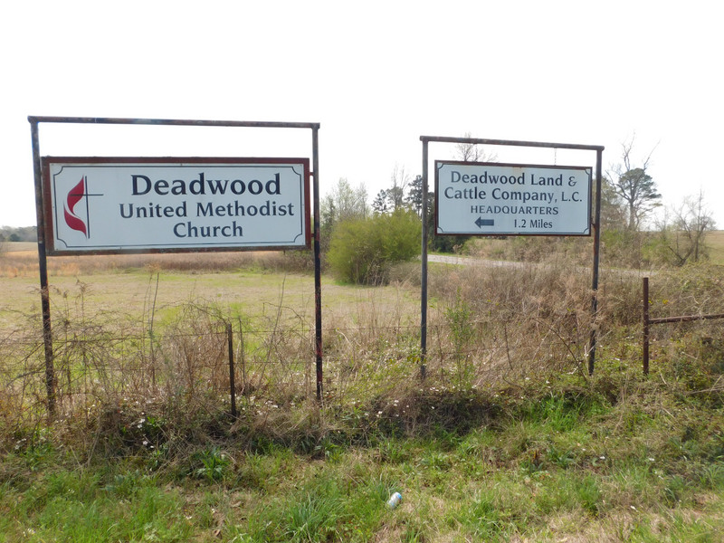 Deadwood Methodist Church & Deadwood Land & Cattle Co signs