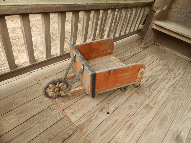 log cabin wheel barrow