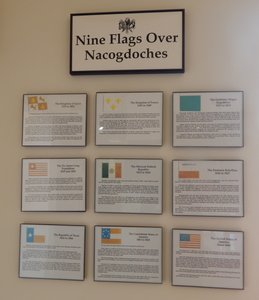 Visitor Center nine flags over Nacogdoches