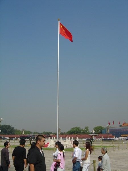 Huge Chinese flag flying in T Square (guarded at all times)